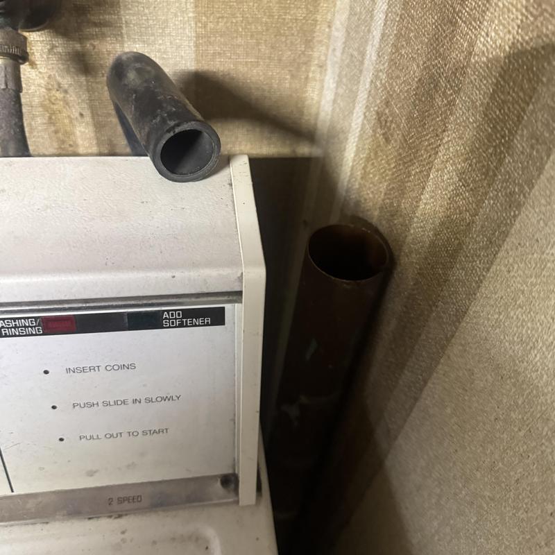 Washing machine drain pipe disconnected from unit