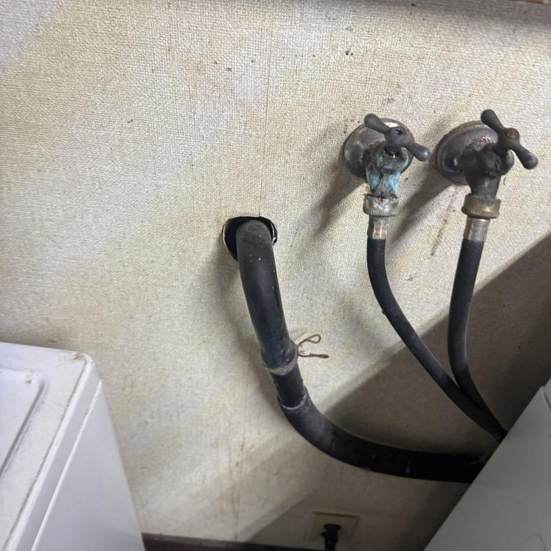 Laundry drain hose and valves with lint clog buildup