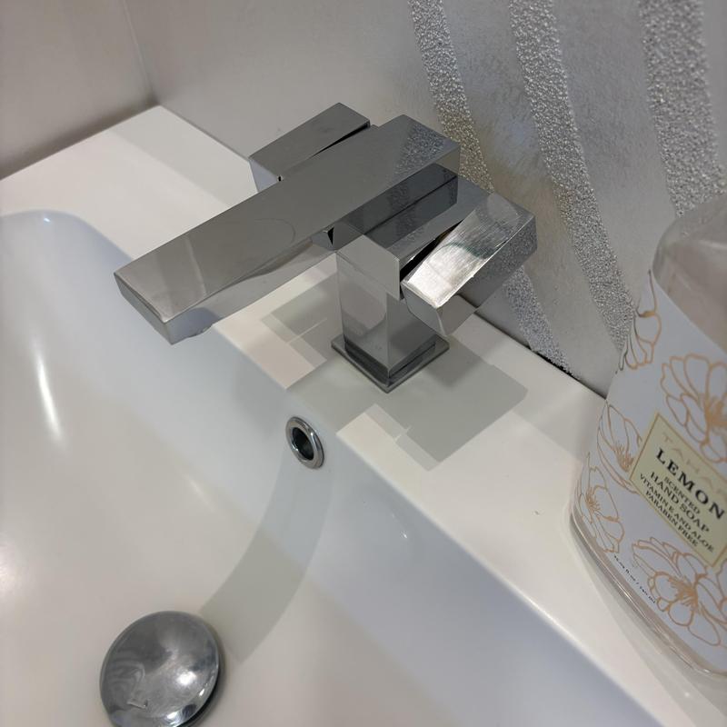 Bathroom sink faucet with new installation and testing