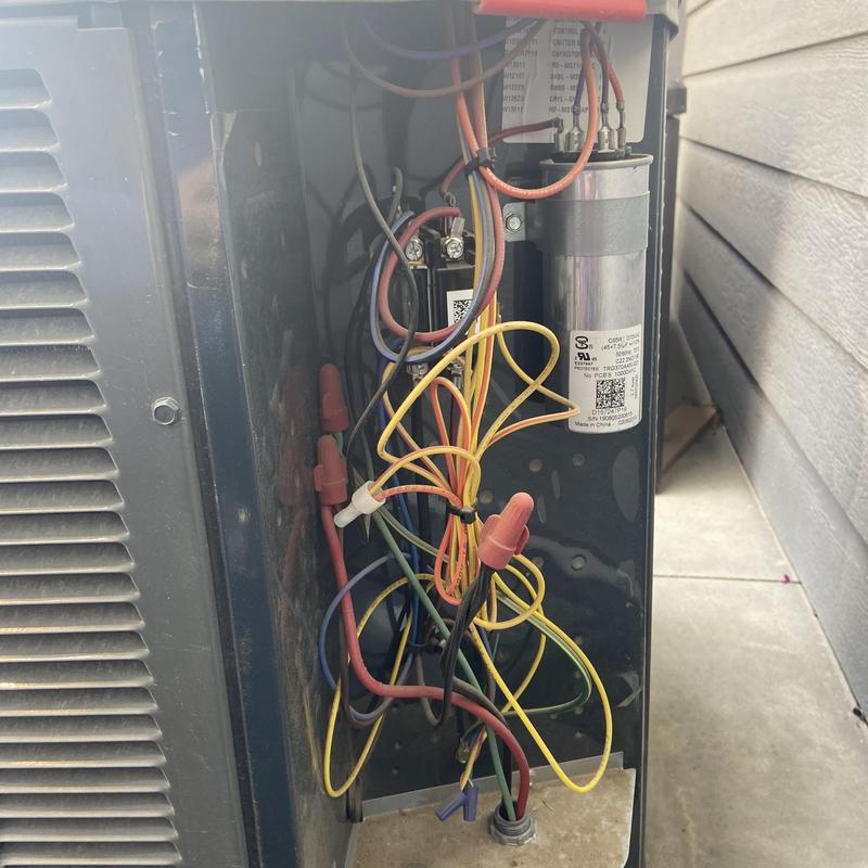 HVAC capacitor and wiring inspection in outdoor unit