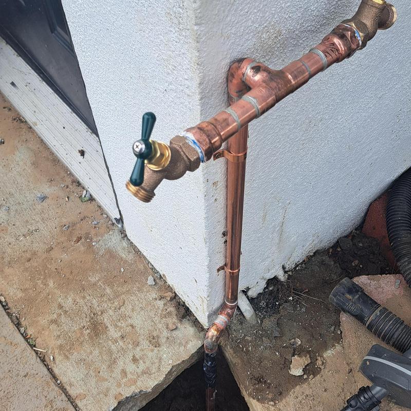 Copper water line with outdoor faucet and leak repair