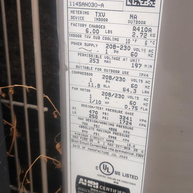 TXV metering device label on air conditioner unit