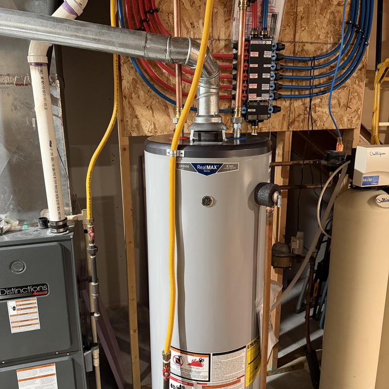 GE RealMAX water heater with venting and piping