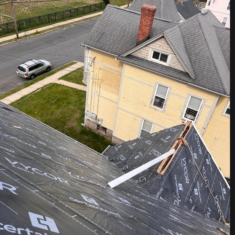 Roof underlayment installation on residential home Roof underlayment installation on residential home