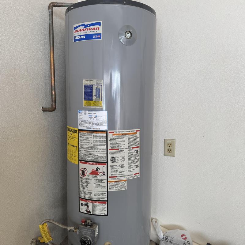 American water heater unit before replacement