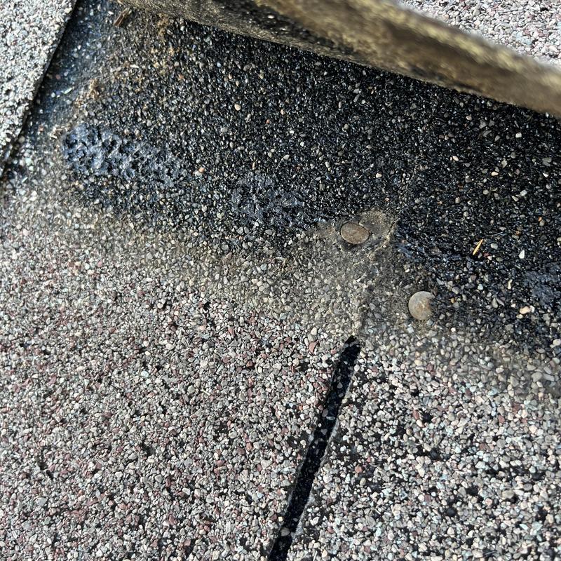Asphalt shingle roof sealant repair near nails