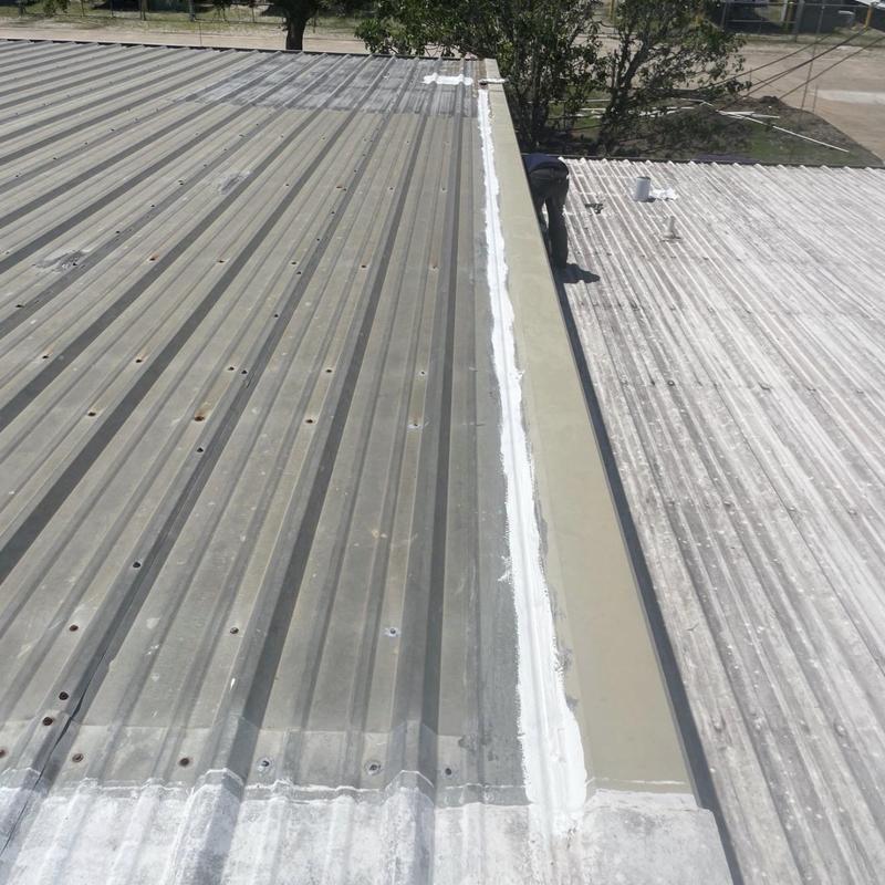 Metal roof seam with fresh sealant application