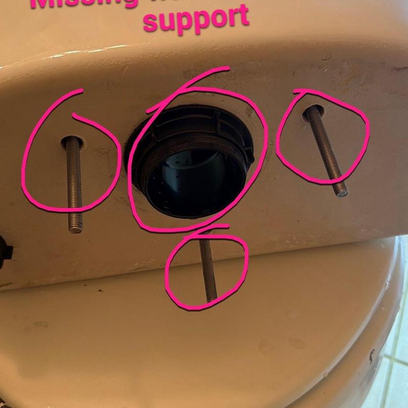 Toilet bowl mounting bolts missing support circled in pink
