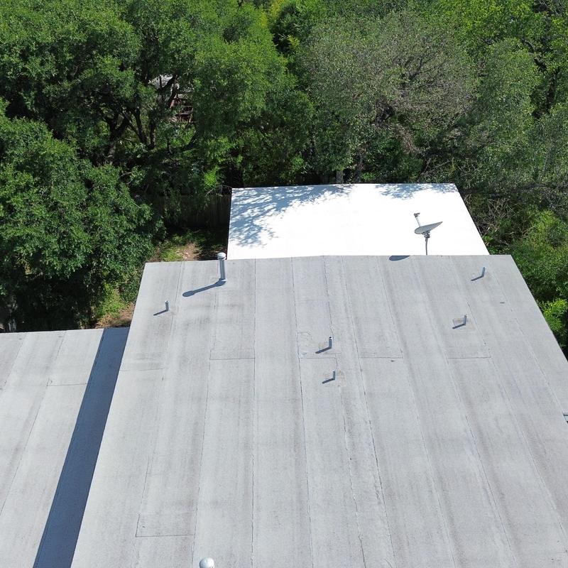 Rolled roofing with hail damage and pipe vents Rolled roofing with hail damage and pipe vents