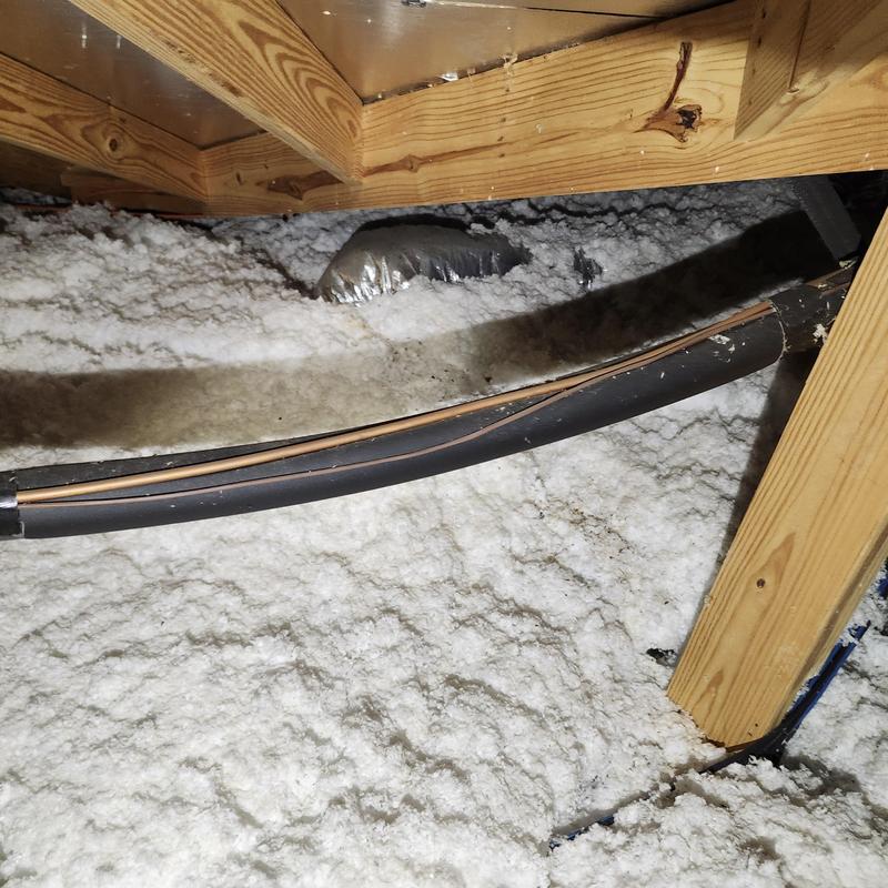 Copper refrigerant line set in attic insulation area Copper refrigerant line set in attic insulation area