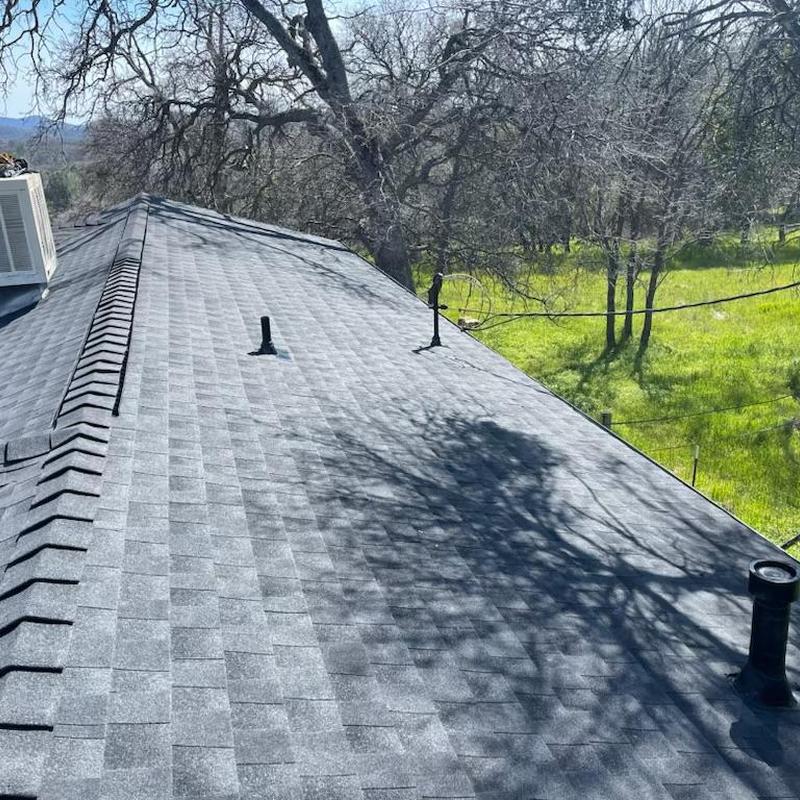 GAF lifetime asphalt roof with ridge vents installed