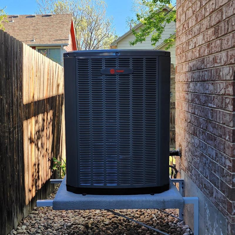 Trane two-stage air conditioner unit outdoors Trane two-stage air conditioner unit outdoors
