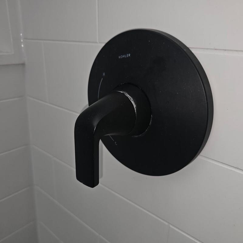 Kohler shower valve cartridge on tiled wall