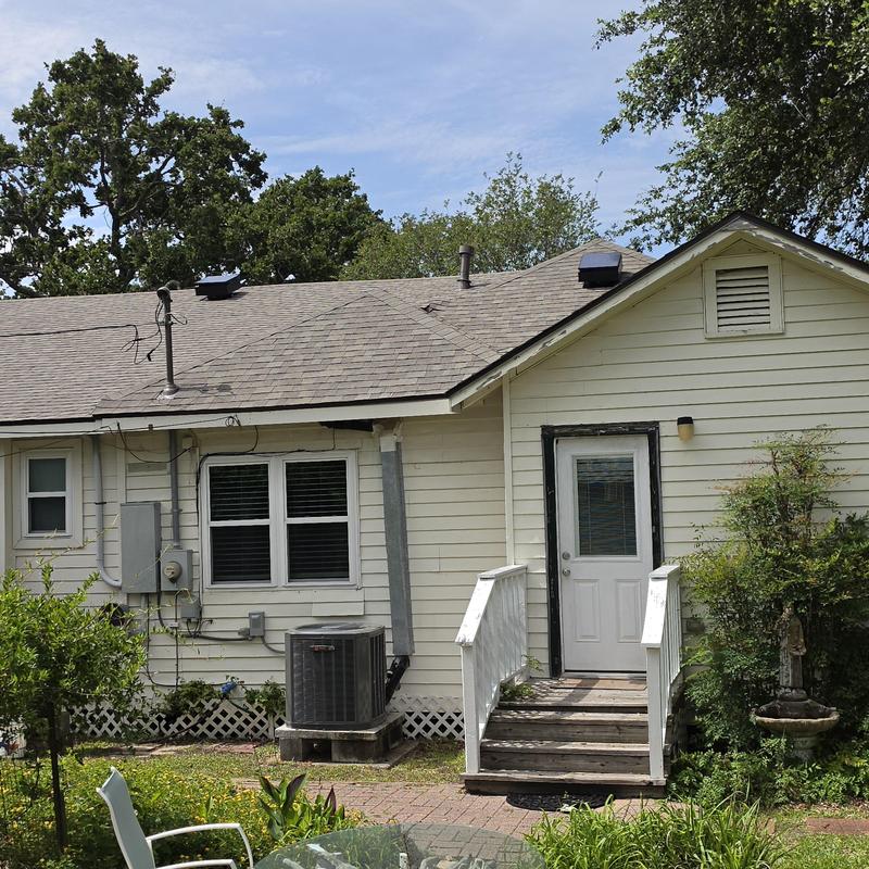 Owens Corning Driftwood shingle roof with solar vent fans