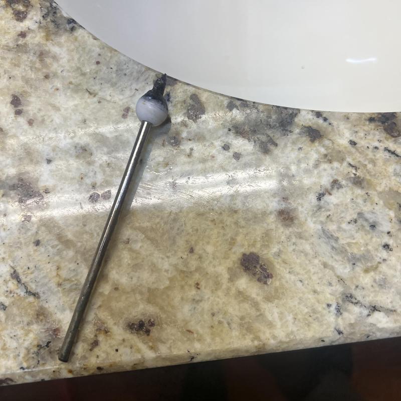 Pop-up drain rod removed on granite countertop Pop-up drain rod removed on granite countertop