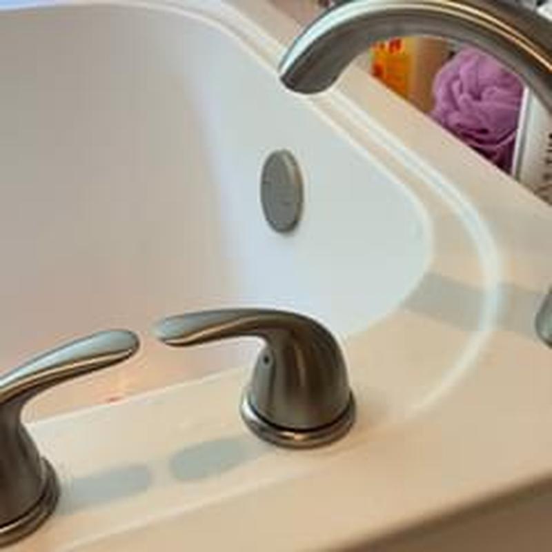 Lavatory faucet with brushed nickel handles installed Lavatory faucet with brushed nickel handles installed