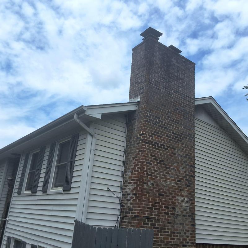 Roof shingles inspection with chimney in Bristol TN