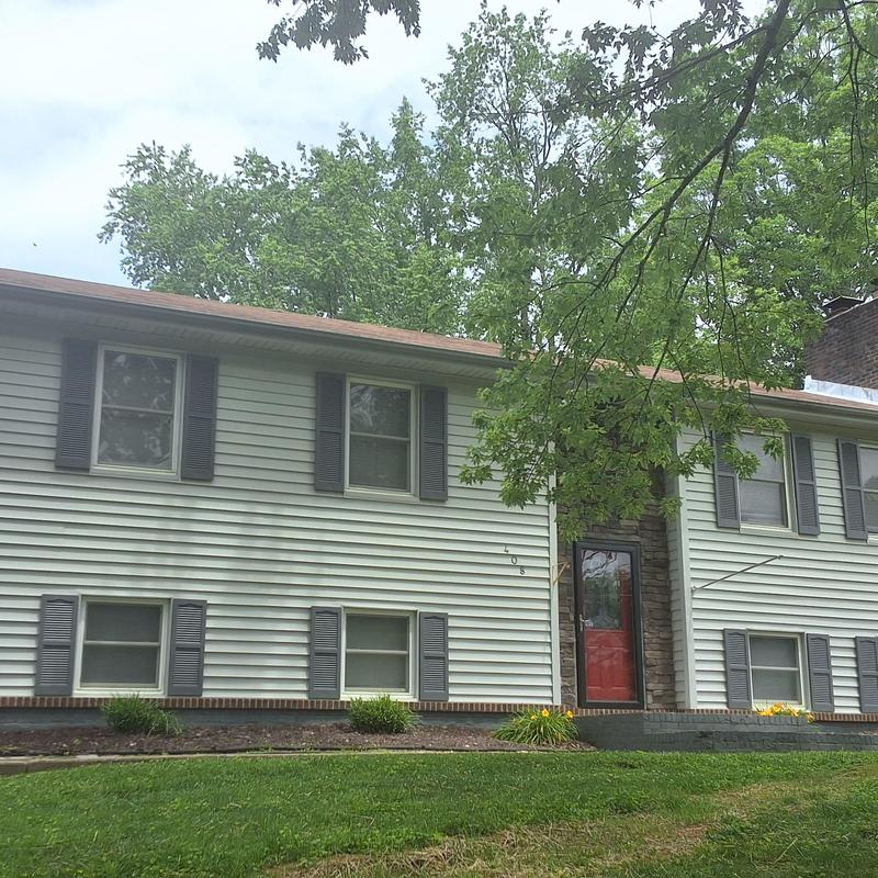 15-year-old roof with leak areas on Bristol home