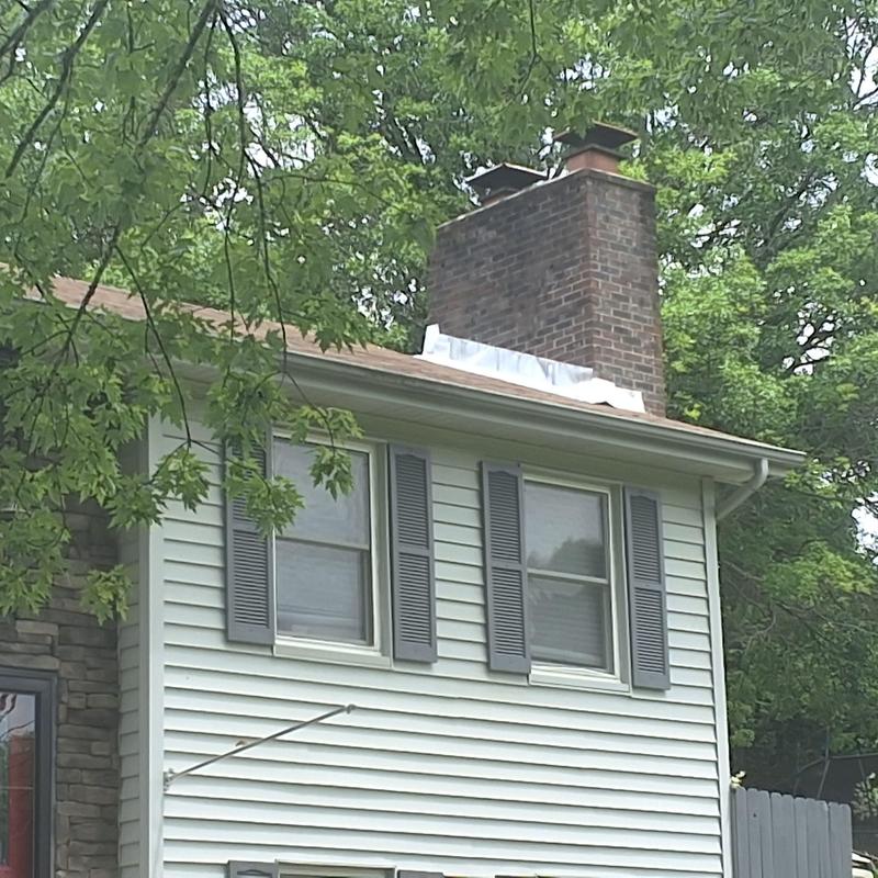 Roof with chimney leak inspection Bristol TN home