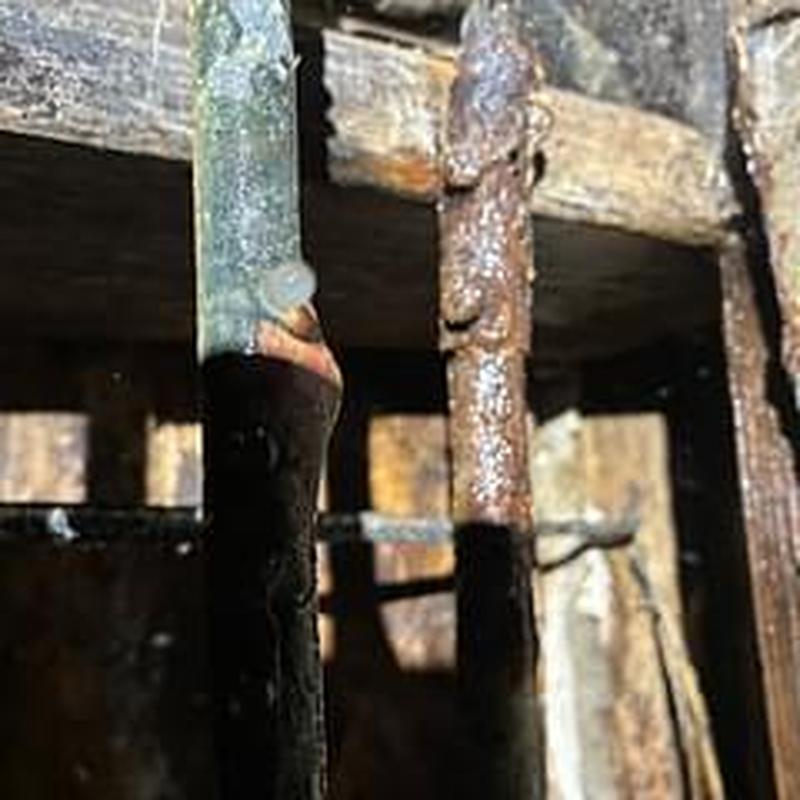 Copper water pipe with corrosion and rust damage Copper water pipe with corrosion and rust damage