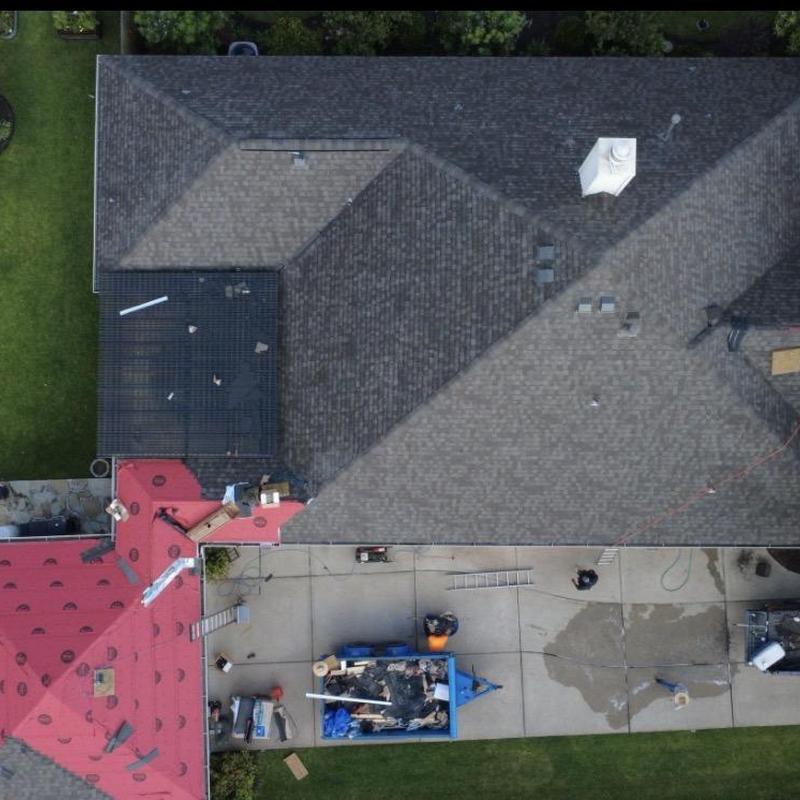 Shingle roof installation with debris removal in Pearland