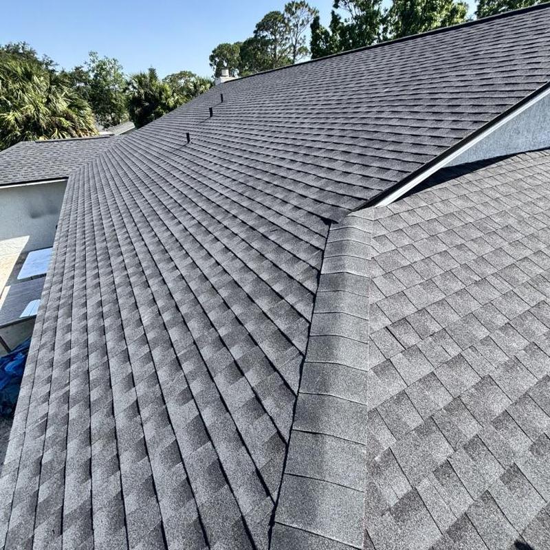 Architectural shingle roof on residential home Architectural shingle roof on residential home
