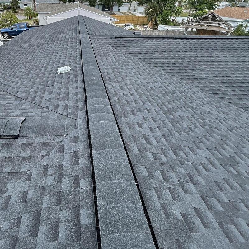 Architectural shingle roof with continuous ridge venting Architectural shingle roof with continuous ridge venting