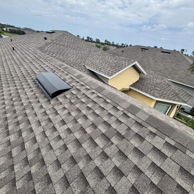 Architectural shingle roof with ridge vent in Florida Architectural shingle roof with ridge vent in Florida