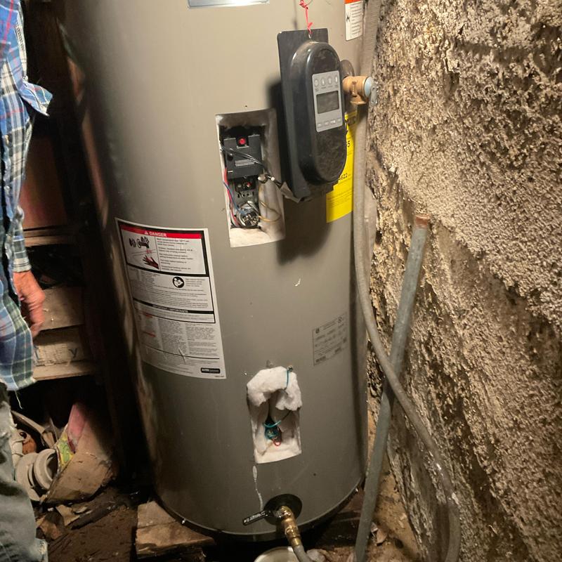 Water heater with control panel and leak inspection Water heater with control panel and leak inspection