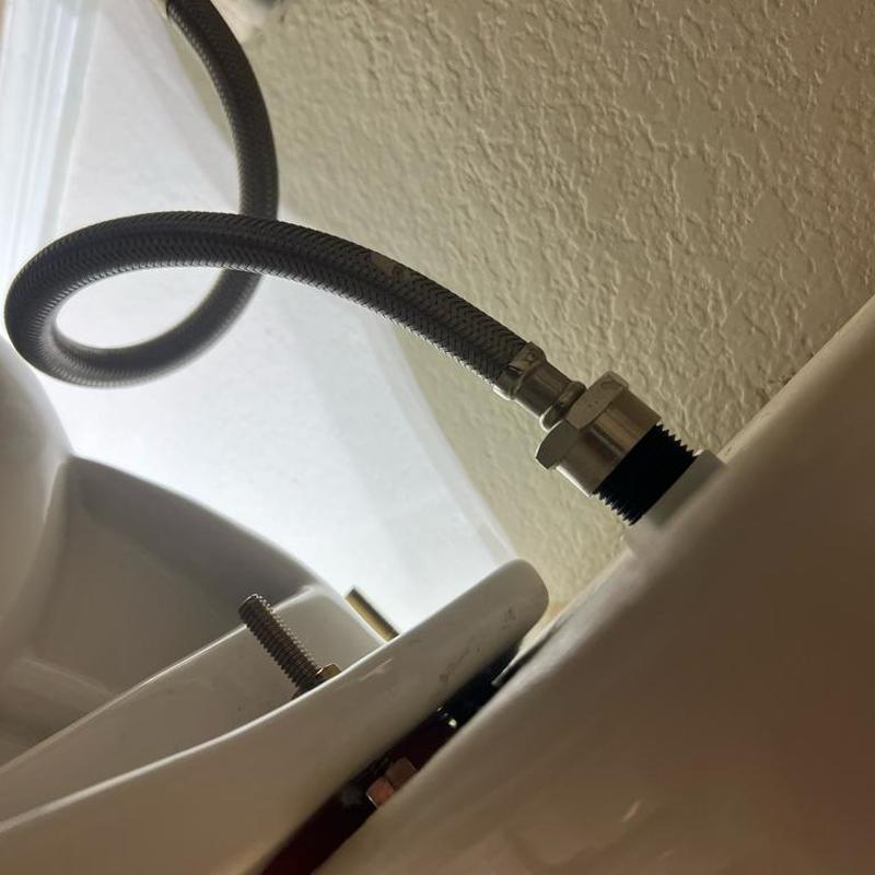 Toilet water supply line connection and tank bolts replacement Toilet water supply line connection and tank bolts replacement