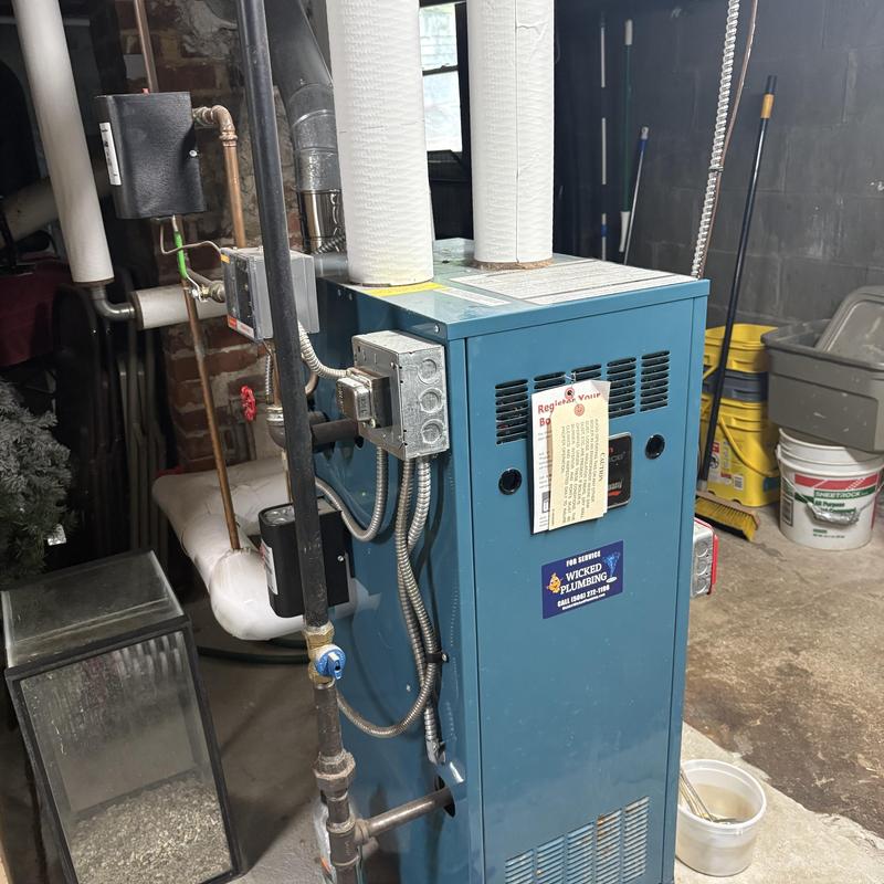 Steam boiler relay and thermostat replacement in basement