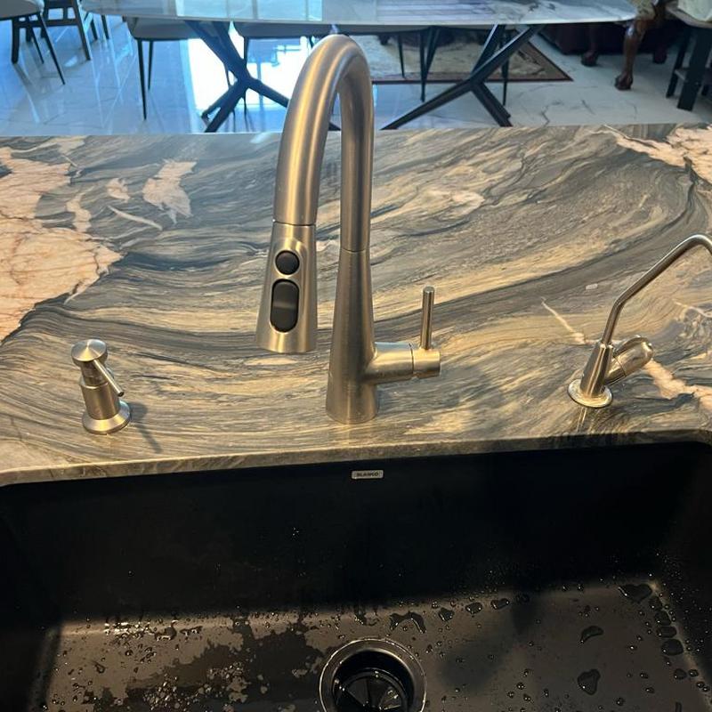 Kitchen faucet and RO system on marble countertop Kitchen faucet and RO system on marble countertop