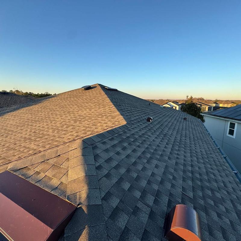 Asphalt shingle roof with vents and clear sky Asphalt shingle roof with vents and clear sky