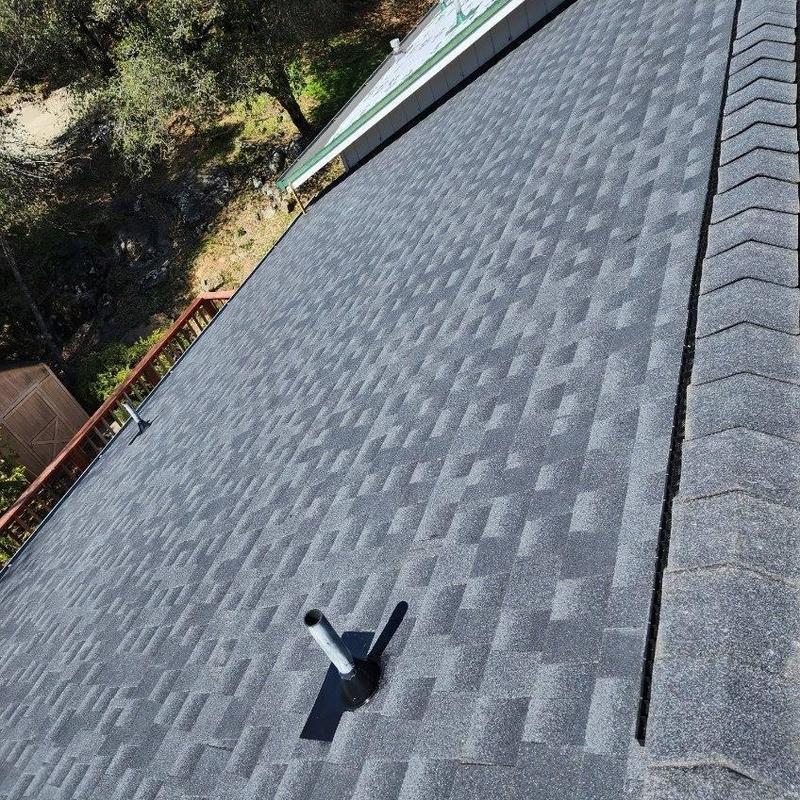 GAF lifetime asphalt roof with vent pipe installed