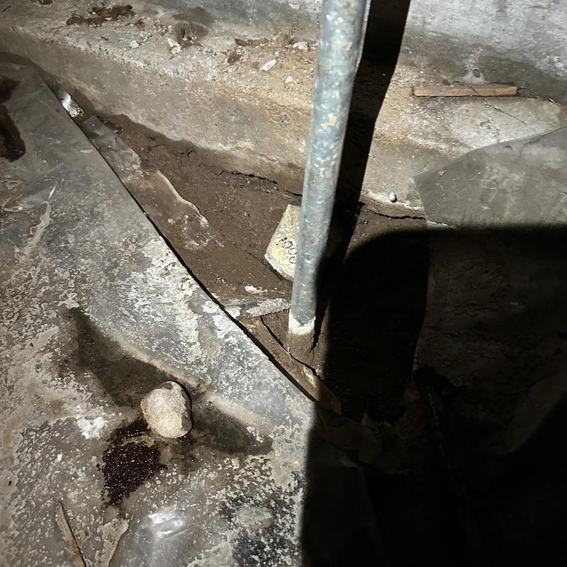 Hose bib pipe with soil-exposed leak under foundation Hose bib pipe with soil-exposed leak under foundation