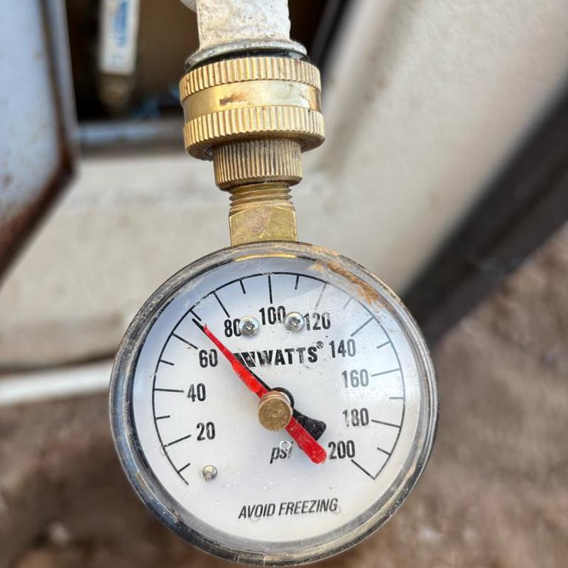 Pressure relief valve gauge showing 70 psi setting Pressure relief valve gauge showing 70 psi setting