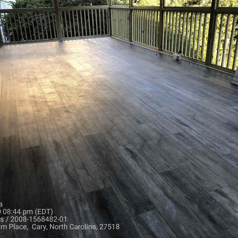 Porcelain wood-look flooring on screened porch addition Porcelain wood-look flooring on screened porch addition