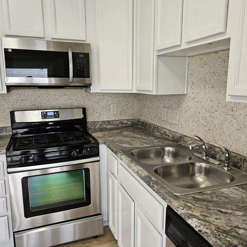 Stainless steel oven and microwave with granite countertops Stainless steel oven and microwave with granite countertops