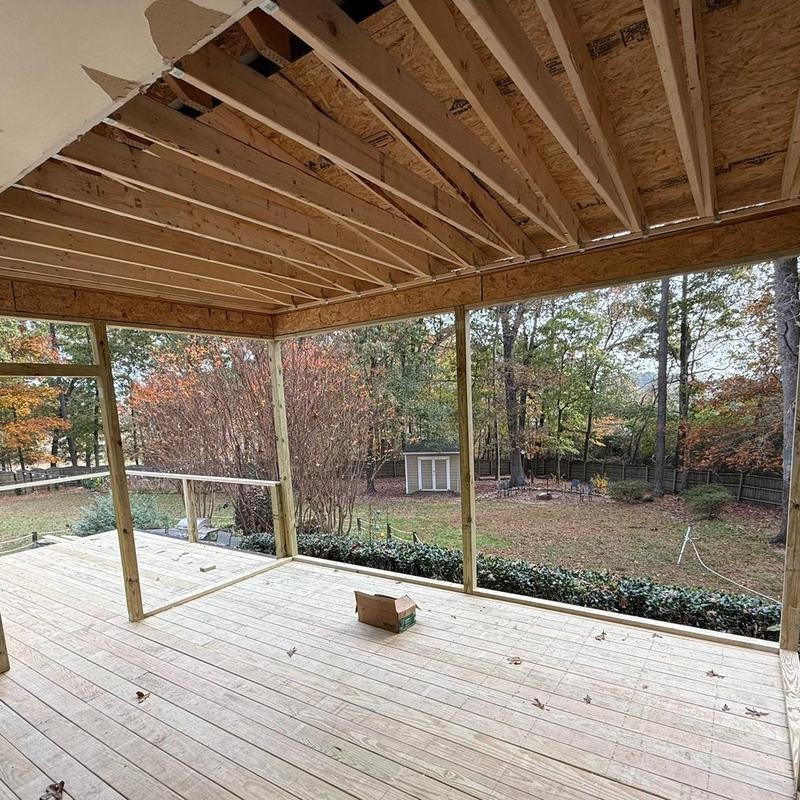 Porch framing and roof joists in backyard remodeling Porch framing and roof joists in backyard remodeling