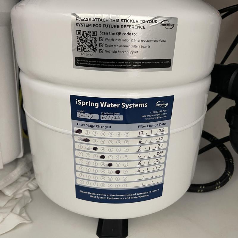 Reverse osmosis water filter tank with maintenance labels