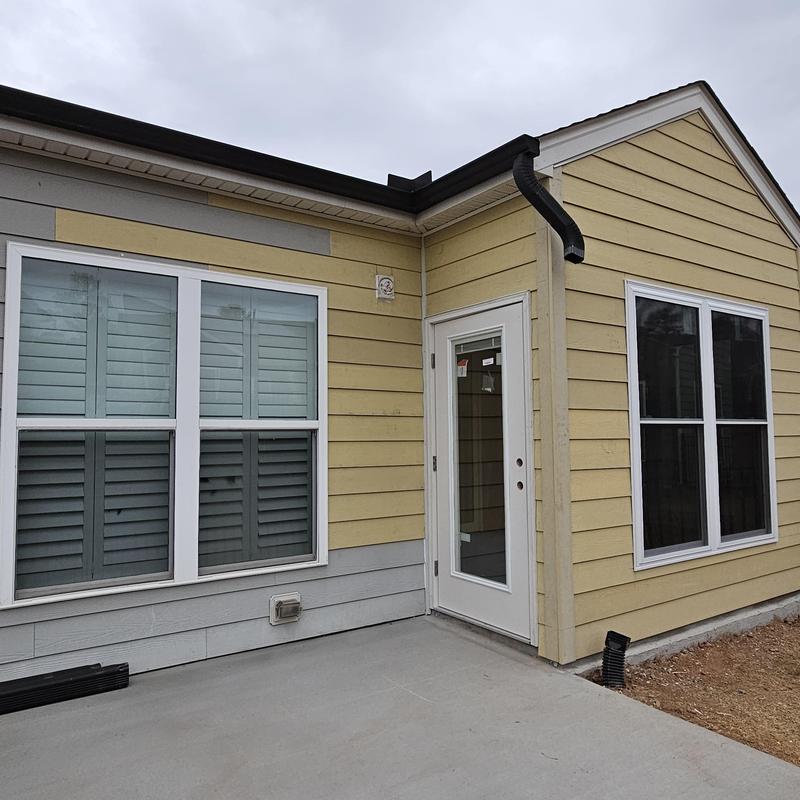 Vinyl siding and window installation on home addition Vinyl siding and window installation on home addition