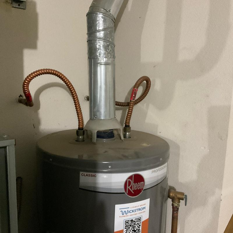 Water heater with copper supply lines and vent pipe Water heater with copper supply lines and vent pipe
