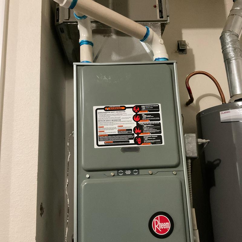 Furnace unit with PVC vent pipes and warning label Furnace unit with PVC vent pipes and warning label