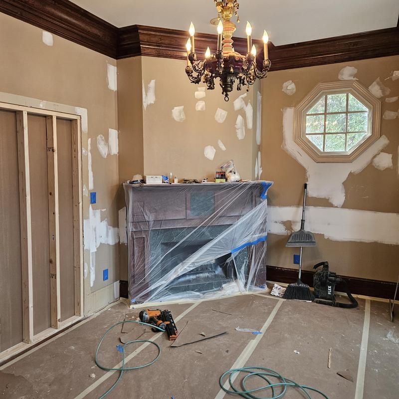 Fireplace renovation with drywall patching and crown molding Fireplace renovation with drywall patching and crown molding