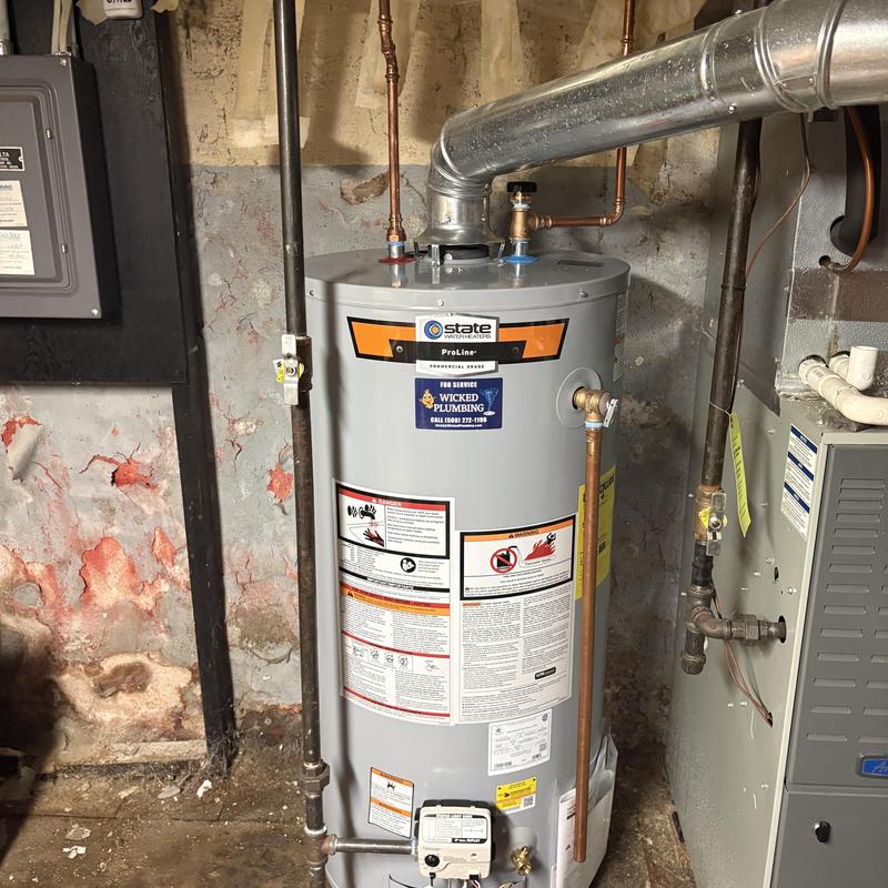 Water heater with warranty inspection and repair tags