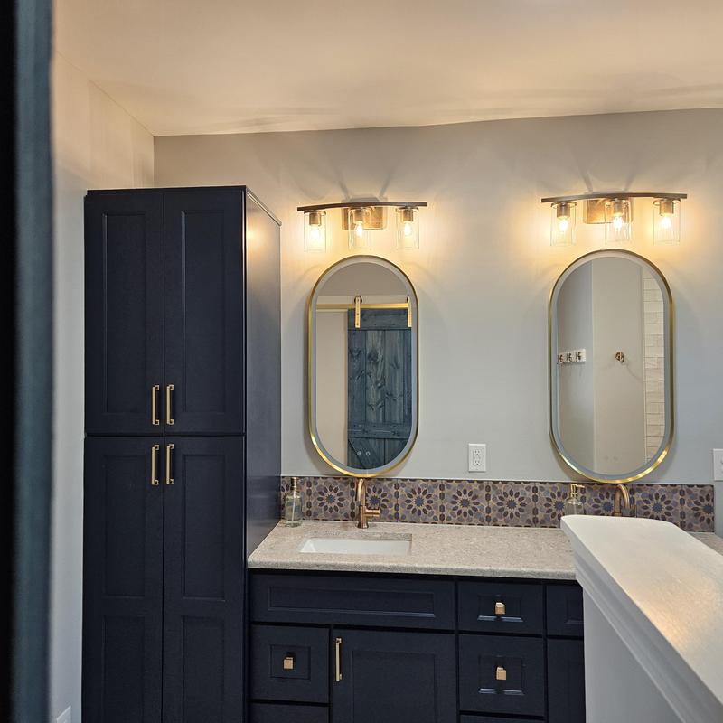 Bathroom vanity with dual mirrors and decorative backsplash Bathroom vanity with dual mirrors and decorative backsplash