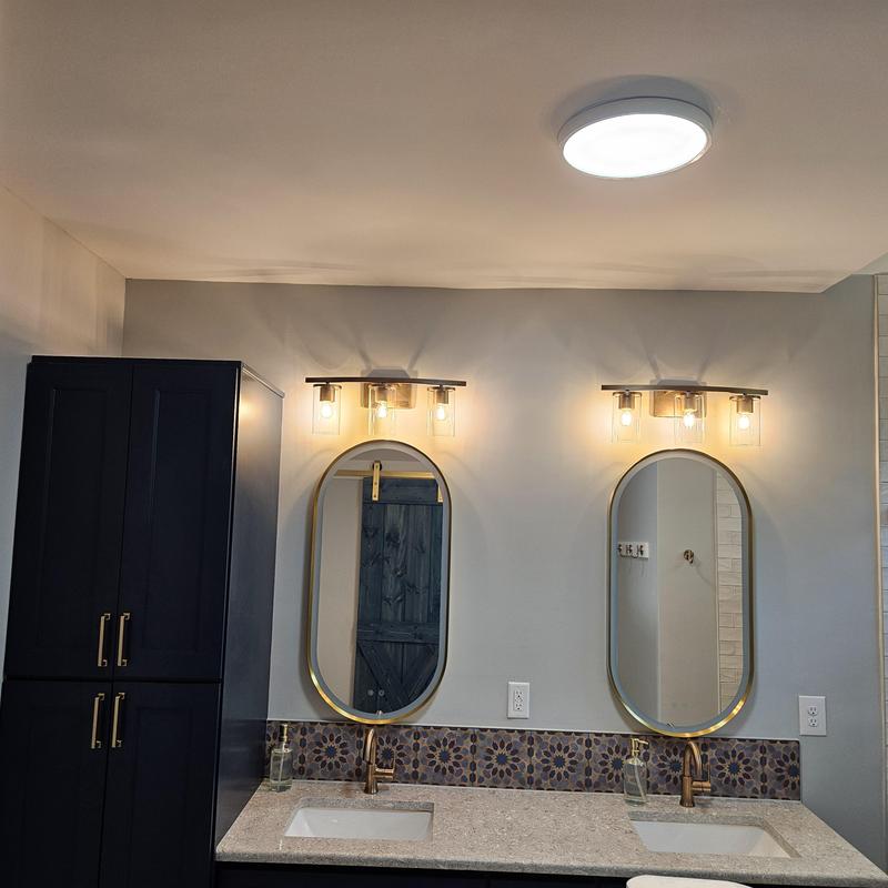 Bathroom double vanity with mirrors and lighting fixtures Bathroom double vanity with mirrors and lighting fixtures