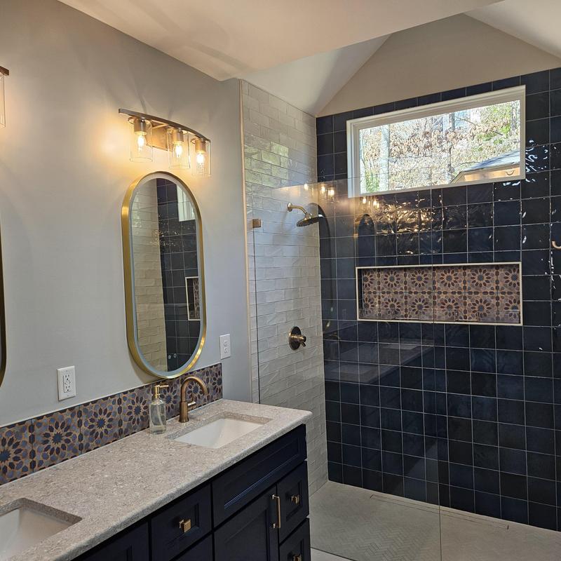 Bathroom shower with decorative tile niche and window Bathroom shower with decorative tile niche and window