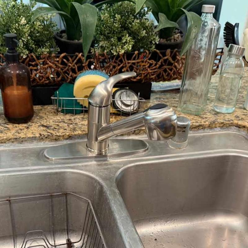 Kitchen sink faucet with pull-out spray installed
