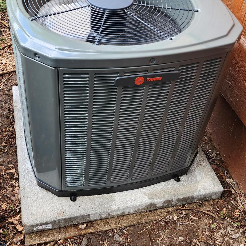 Trane 5TTR30 air conditioner unit on concrete pad